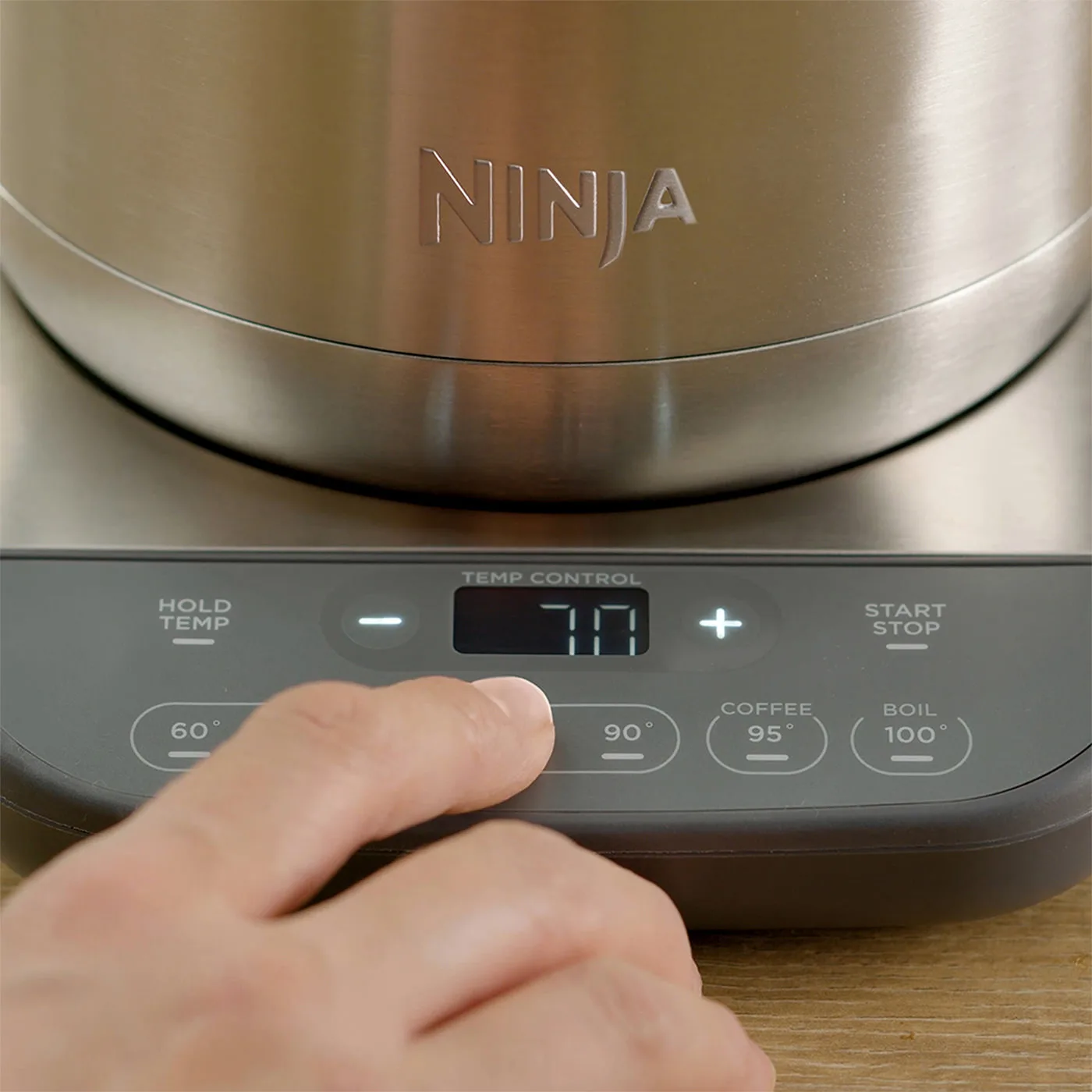 Ninja-KT201UK-In_Use-Kitchen-Woman-UI-Button_Press-VideoStill